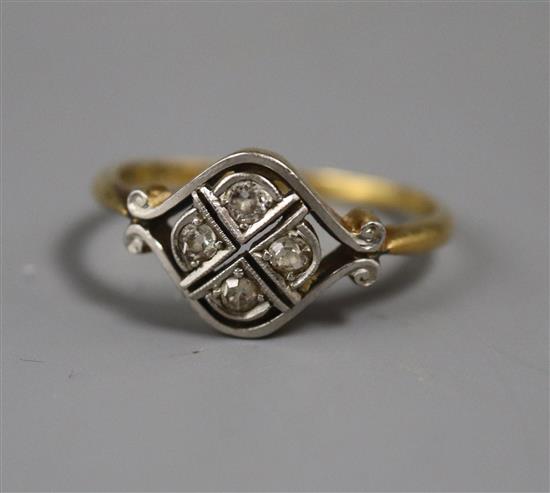 A 1920s 18ct & plat, four stone diamond set dress ring, size M.